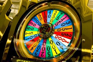 Live dealer spinning Lightning Roulette wheel in professional studio